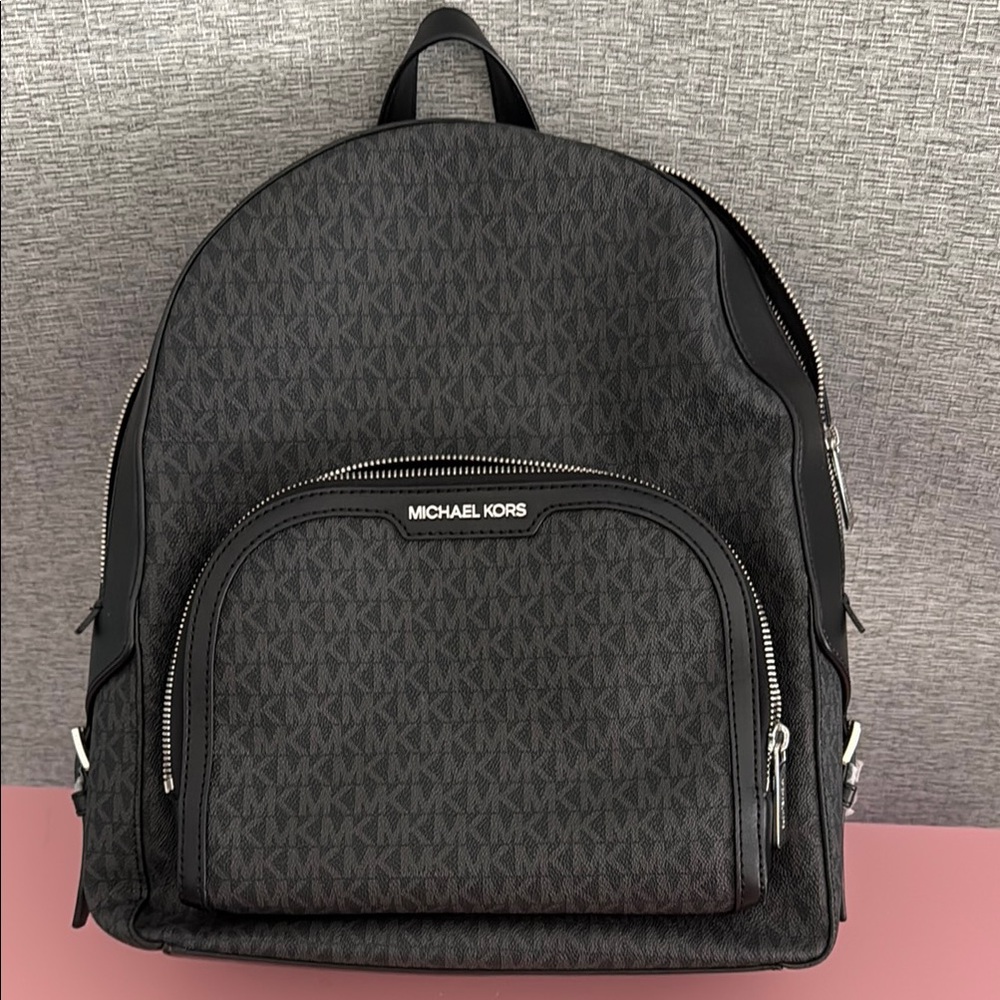 Michael Kors Black Backpack with Elegant Monogram Design